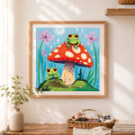 Finished mushroom frog friends cross stitch artwork displayed as home decor