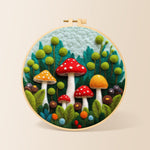 Mushroom group in forest needle felting kit for beginners with a round wooden frame