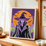 Mysterious halloween witch punch needle artwork displayed on a table