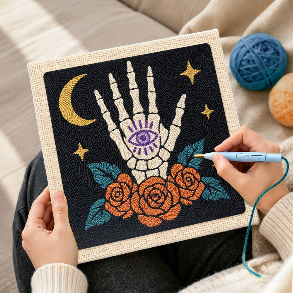 Creating handmade mystic skeleton hand punch needle artwork