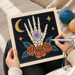 Creating handmade mystic skeleton hand punch needle artwork