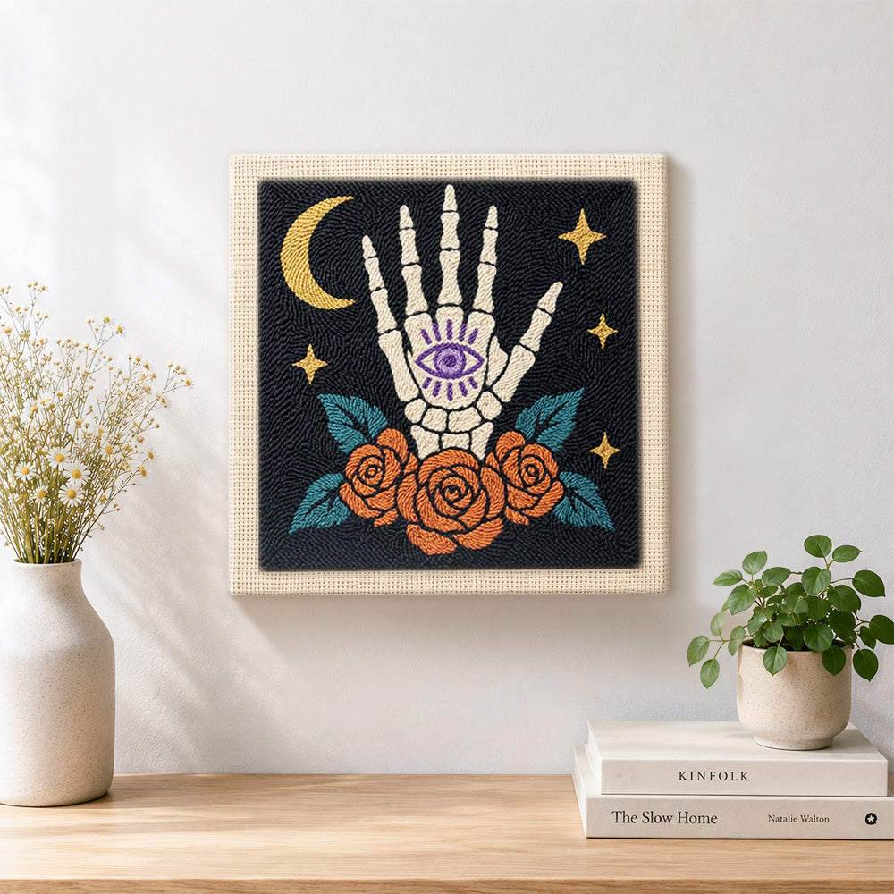 Finished mystic skeleton hand artwork displayed on a wall