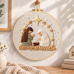 Nativity scene embroidery hoop wall art displayed as warm and cozy handmade home decor
