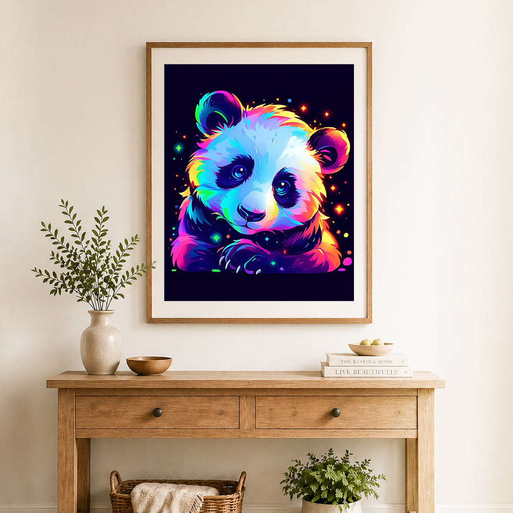 Finished neon glow panda cross stitch artwork displayed as home decor