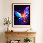 Finished neon glowing butterfly cross stitch artwork displayed as home decor