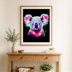 Finished neon rainbow koala cross stitch artwork displayed as home decor