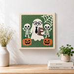 Finished nerd ghost with skeleton friends artwork displayed on a wall