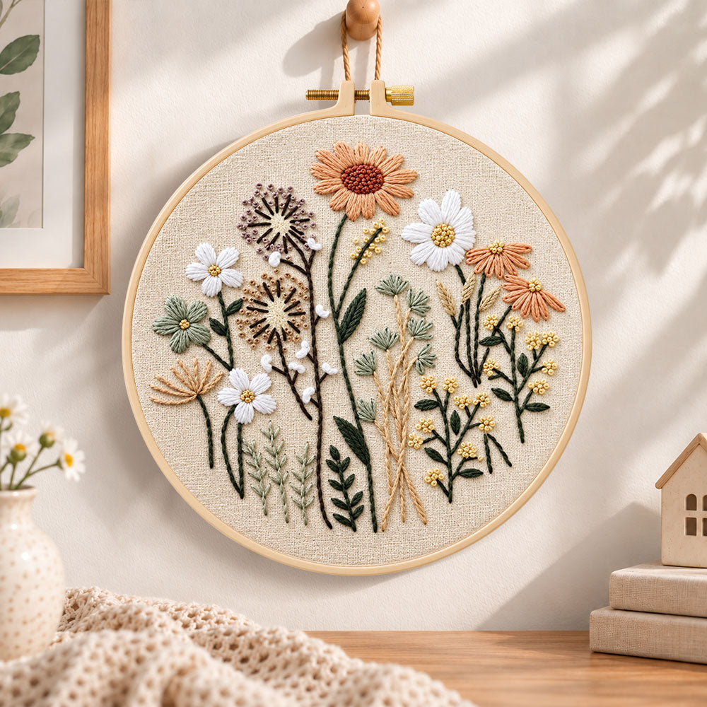 Neutral wild blooms embroidery hoop wall art displayed as warm and cozy handmade home decor