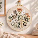 Neutral wild blooms embroidery hoop wall art displayed as warm and cozy handmade home decor