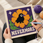 Creating handmade nevermore raven floral punch needle artwork