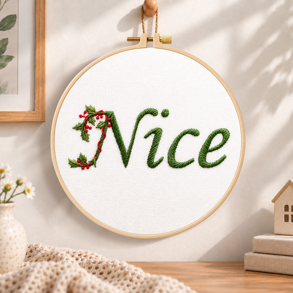 Nice holly lettering embroidery hoop wall art displayed as warm and cozy handmade home decor