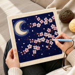 Creating handmade night sky cherry blossom punch needle artwork