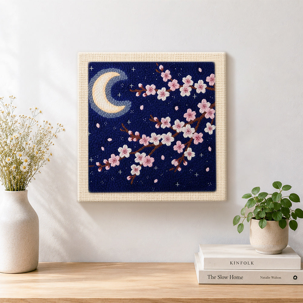Finished night sky cherry blossom artwork displayed on a wall