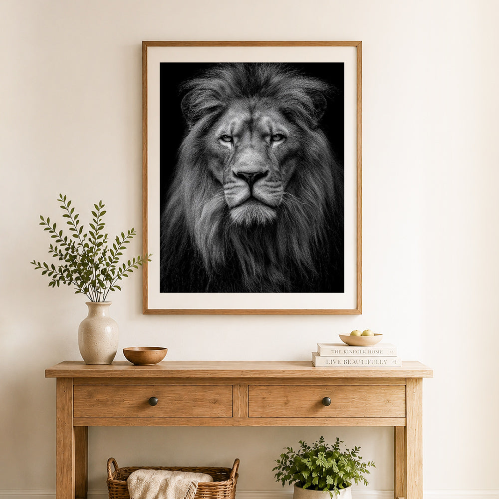 Finished noble black‑white lion cross stitch artwork displayed as home decor