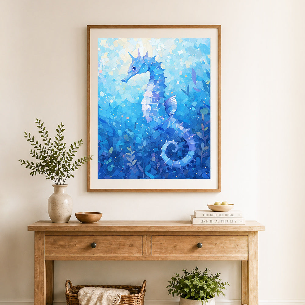 Finished ocean blue seahorse cross stitch artwork displayed as home decor