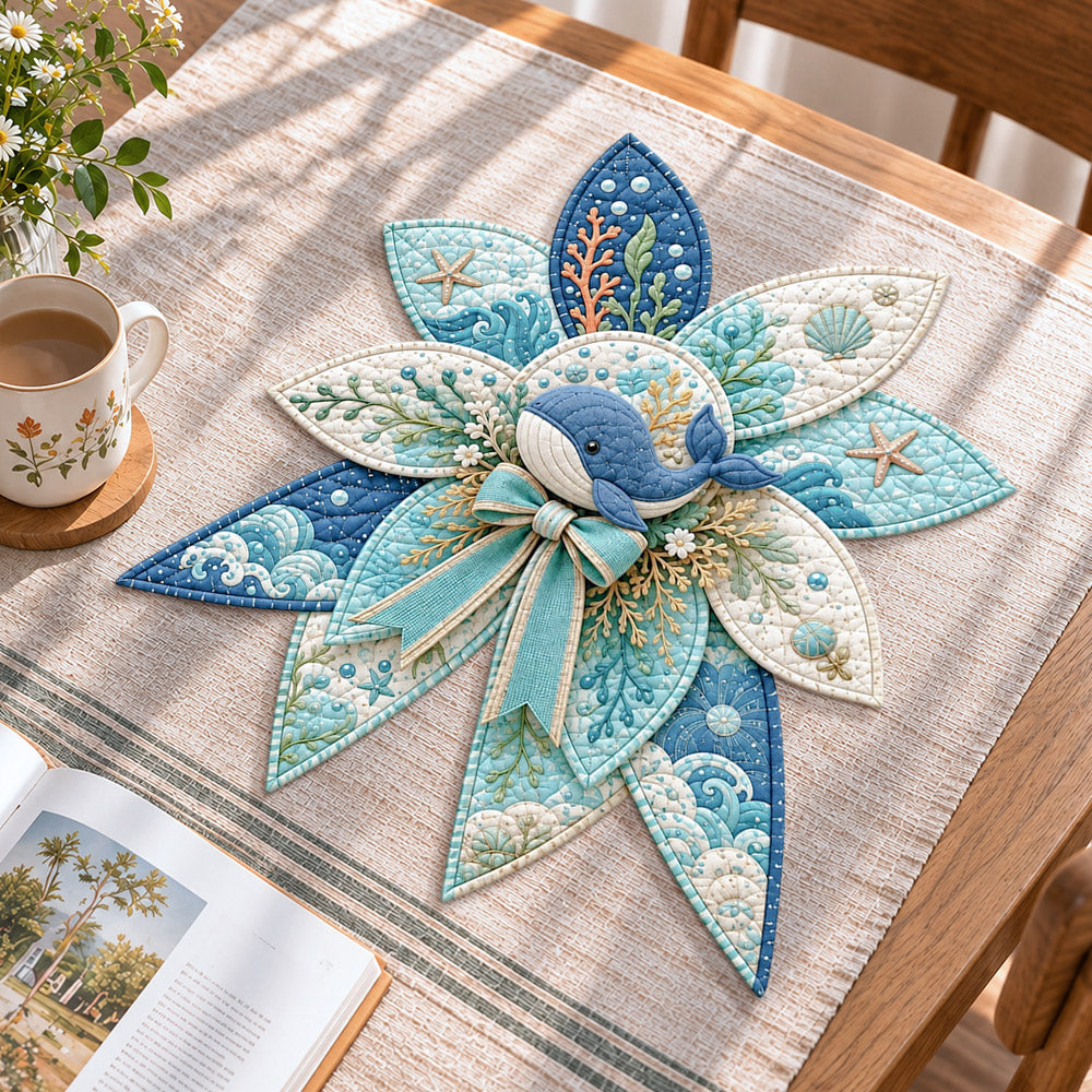Ocean whale handmade quilted bow displayed on a table as seasonal home decor