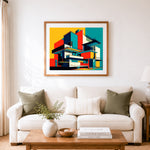 Finished old color block building cross stitch artwork displayed as home decor