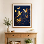 Finished olden glitter butterflies in starry sky cross stitch artwork displayed as home decor