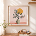 Finished olive branch in vase under sun cross stitch artwork displayed as home decor