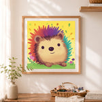 Finished olorful cheerful hedgehog cross stitch artwork displayed as home decor