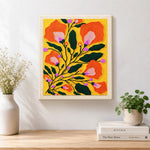 Finished orange bell flowers artwork displayed on a wall