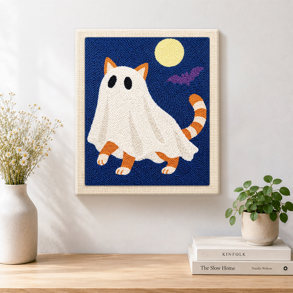 Finished orange ghost cat under full moon artwork displayed on a wall