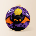 Orange-winged bat under the purple night needle felting kit for beginners with a round wooden frame
