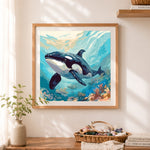 Finished orca underwater coral scene cross stitch artwork displayed as home decor