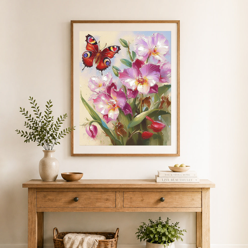 Finished orchid and butterfly cross stitch artwork displayed as home decor