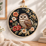 Owl on dark floral embroidery hoop wall art displayed as warm and cozy handmade home decor