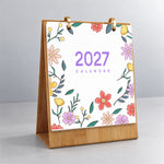 Floral Blooms Paint by Numbers Calendar displayed upright on its wooden stand with decorative flower illustrations