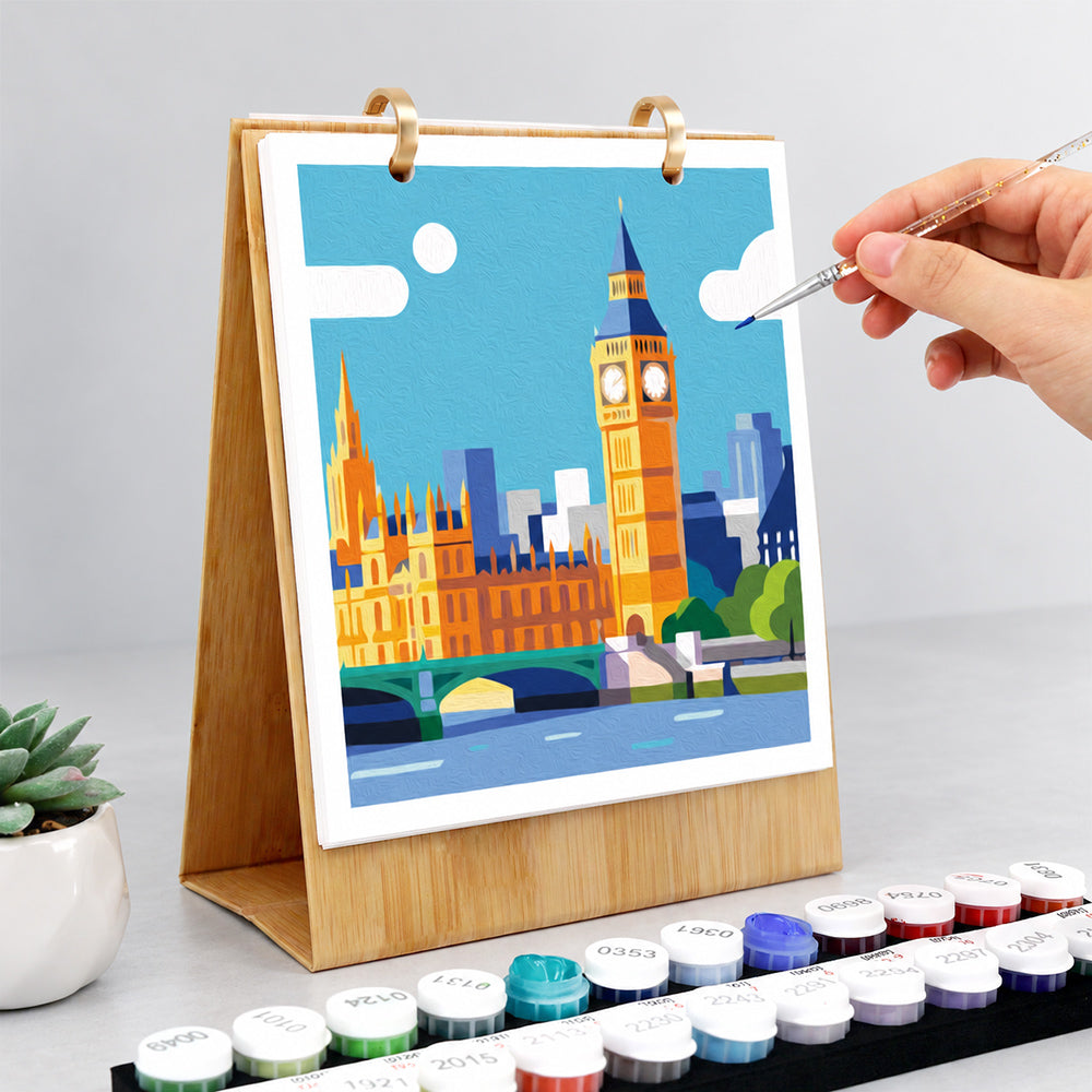 Hand painting the Big Ben and Houses of Parliament illustration on the Iconic Landmarks Paint by Numbers Desk Calendar