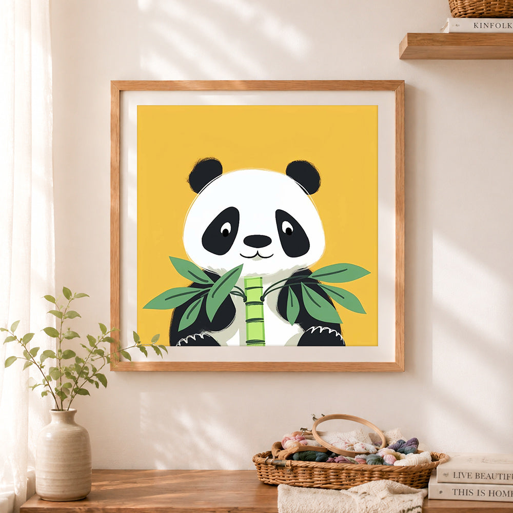 Finished panda with bamboo cross stitch artwork displayed as home decor