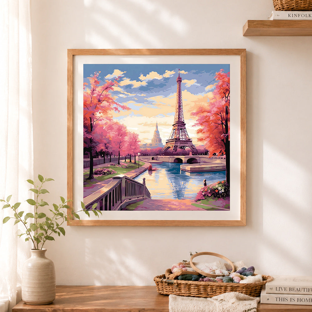 Finished paris eiffel tower view cross stitch artwork displayed as home decor