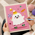 Creating handmade party ghost with lollipop punch needle artwork