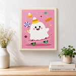 Finished party ghost with lollipop artwork displayed on a wall