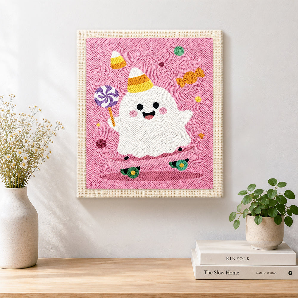 Finished party ghost with lollipop artwork displayed on a wall