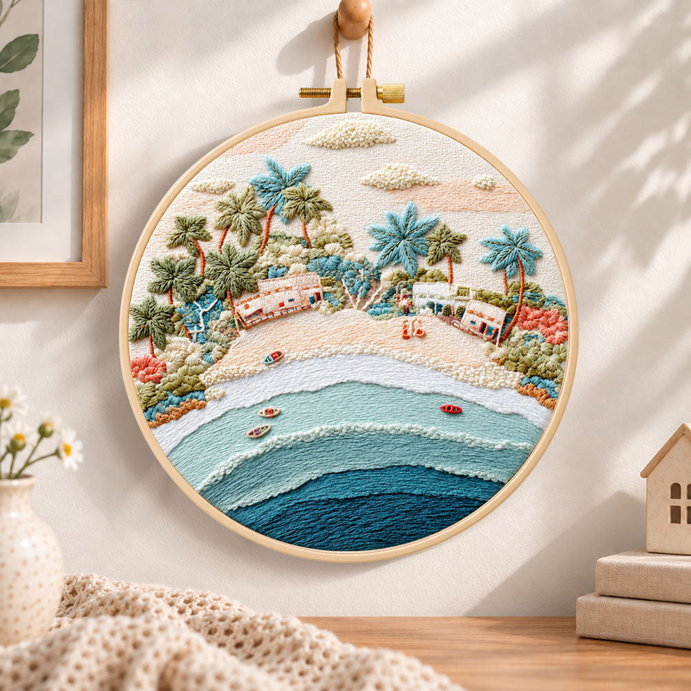 Pastel beach coast embroidery hoop wall art displayed as warm and cozy handmade home decor