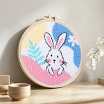 Pastel bunny dream punch needle artwork displayed on a table