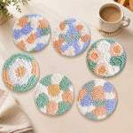 Pastel geometric patterns punch needle coasters used for home decoration