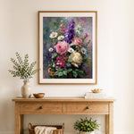 Finished pastel wild bouquet cross stitch artwork displayed as home decor