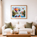 Finished pastoral river balloon ride cross stitch artwork displayed as home decor