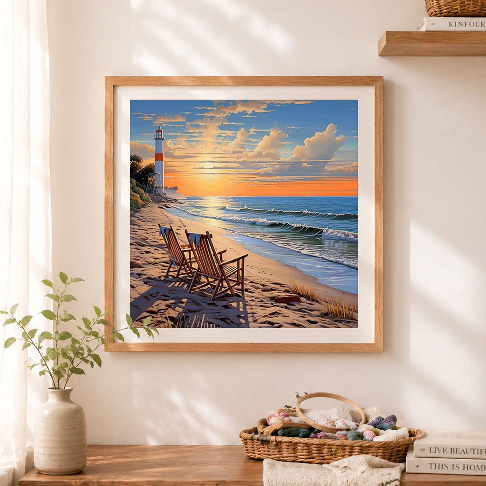 Finished peaceful lighthouse and beach chairs at sunset cross stitch artwork displayed as home decor