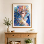 Finished peacock goddess cross stitch artwork displayed as home decor