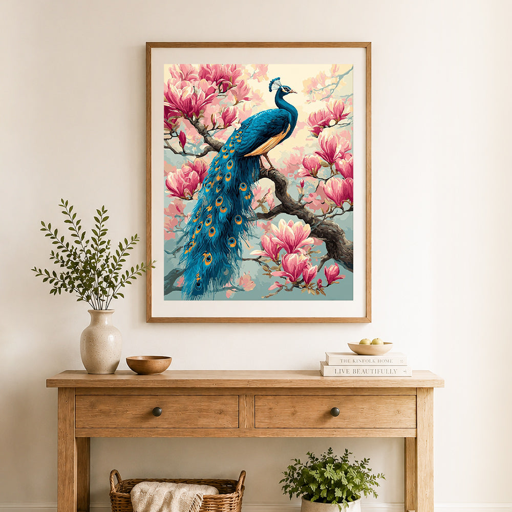 Finished peacock on magnolia cross stitch artwork displayed as home decor