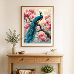Finished peacock on magnolia cross stitch artwork displayed as home decor