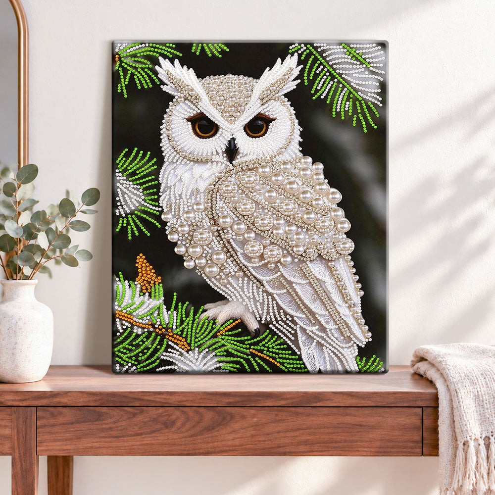 Finished pearl owl in pine pearl diamond painting artwork displayed as home decor