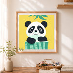 Finished peeking baby panda cross stitch artwork displayed as home decor