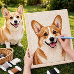 Personalised pet photo punch needle kit in progress with a matching dog and handmade canvas artwork outdoors