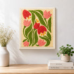 Finished pink and red bell flowers artwork displayed on a wall